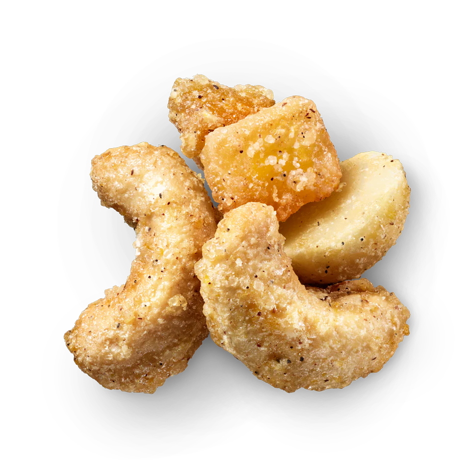 Glazed cashews, macadamias, and orange mango pieces with a tangerine vanilla coating.
